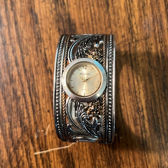 Kessaris Accessories - Kessaris ladies/women’s cuff bracelet watch; Silver gold floral leaf design.